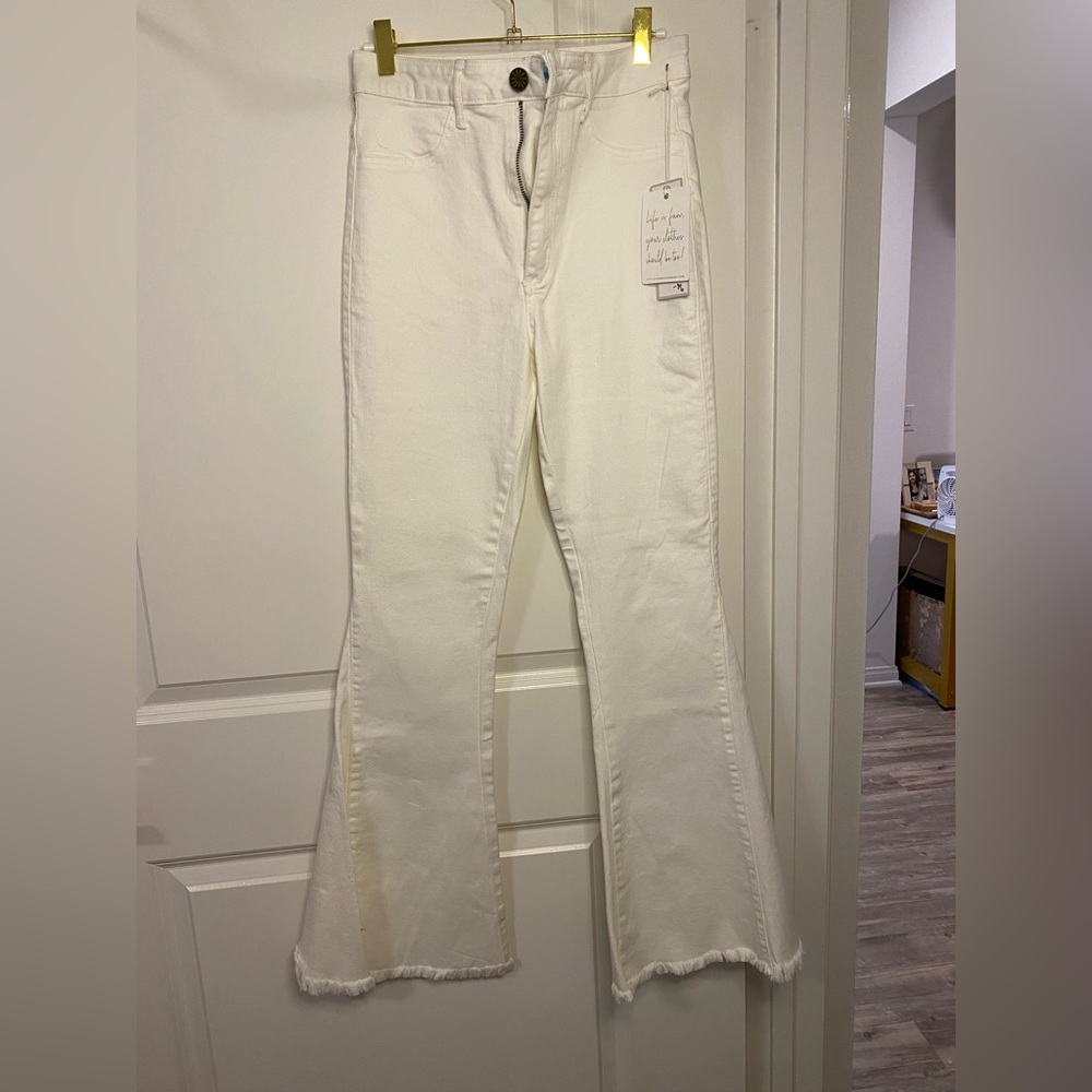 White wide ultra flared jeans